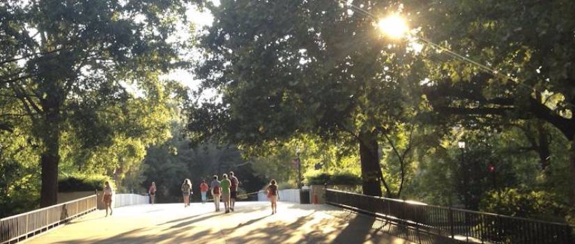 Students walk across a bridge leading to the Horseshoe at the University of South Carolina, Columbia.