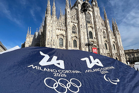 Milan, Italy - September 14, 2024: official logo Olympic games in Milan and Cortina 2026 on background of Cathedral Duomo