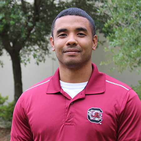 A man wearing a Gamecock polo