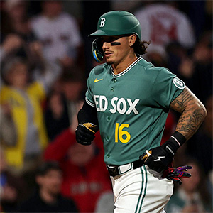 Boston Red Sox player in green Nike-branded uniform with the No. 16 appears wearing batting helmet