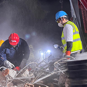 USC student Aquiles Agreda helps clean up rubble at night after two massive earthquakes struck Venezuela.