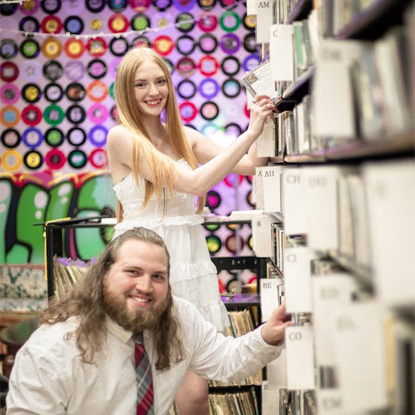 Photo of Maddie Zediker and her finance at the campus radio station